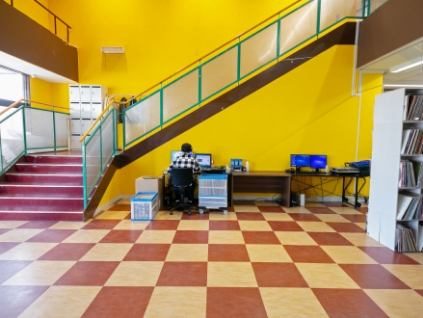 Staff member picking records from a shelf